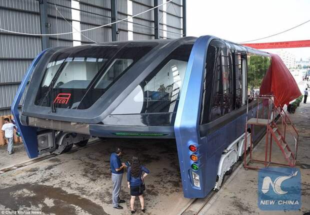 В Китае прошли испытания портального надземного автобуса автобус, китай, общественный транспорт, пробки