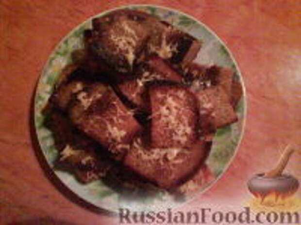 Фото к рецепту: Гренки с чесноком и сыром
