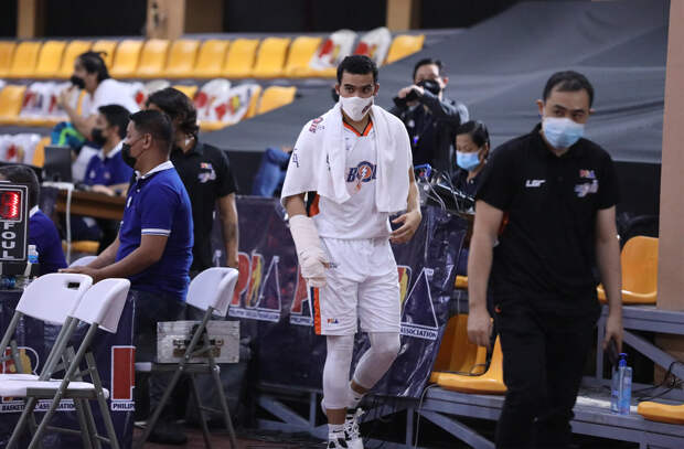 Meralco's Aaron Black injures hand.