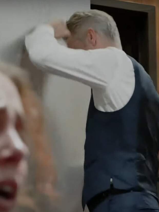 Caarisi banging his head against the wall during a hostage situation on Law & Order: SVU Season 26 Episode 8