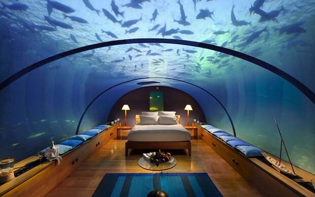 Номер виллы, расположенный в воде (Отель Conrad Maldives).