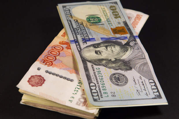 Курс доллара утром 14 мая вырос до 91,36 рубля