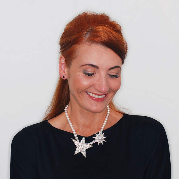 4 Modern Ways to Style a Classic Pearl Necklace | 1. With diamanté brooches
