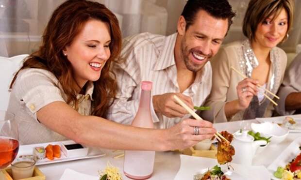 We eat 47% more when eating with two other people.